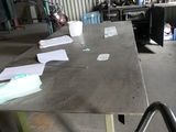 a table that has a lot of papers on it