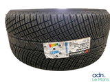 a close up of a tire on a white background