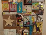 a cardboard display with lots of different items on it
