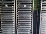 several metal trays are stacked on top of each other