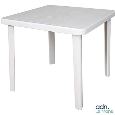 the table is white and has a white top and legs