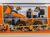 a box with a toy truck in it on a table
