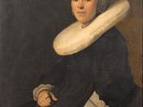 portrait of a woman in a black dress with a white ruffle on her head