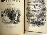an old book with a picture of a couple of people sitting on a bench