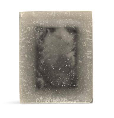 an image of a soap bar with a black and white image of a square