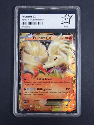 a close up of a pokemon card on a black surface
