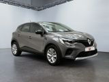 a grey renault c - cross parked in a garage