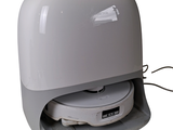 a white toaster sitting on top of a counter