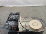 a white hat sitting on top of a black box