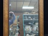 a picture of a person taking a picture of themselves in a mirror