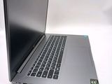 an open laptop computer sitting on top of a white table