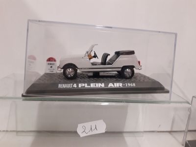 a display case with a model of a car in it