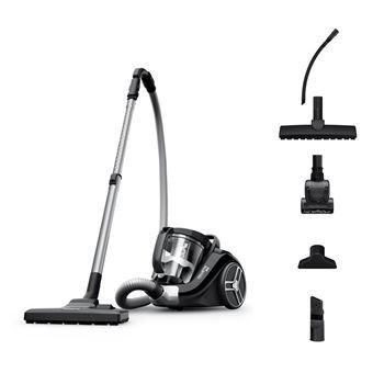 black and white photo of a vacuum cleaner and other accessories