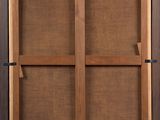 a close up of a picture of a wooden frame with a window