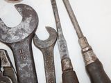 a lot of tools that are sitting on a table