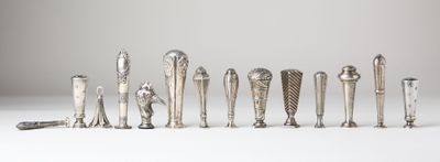 a lot of silver objects that are on the table