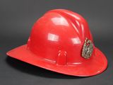 an image of a red hard hat with a crown on it