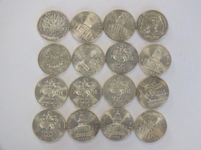 a lot of coins that are sitting on a table