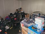 a cluttered room with a lot of clutter on the floor