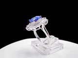 an image of a blue sapphire and diamond ring
