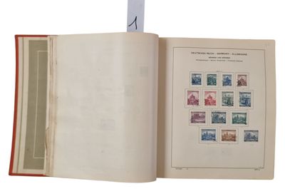 an open book with stamps on it on a white surface
