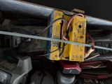 a pile of assorted electrical equipment in a garage