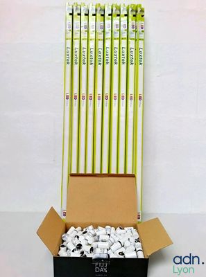 a box of pencils that are sitting on a table