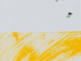 two pictures of a piece of paper with yellow paint on it and a black piece of paper with a white