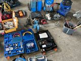 a lot of tools that are sitting on the ground