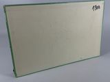 a close up of a book with a green border on it