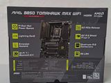 the box of the motherboard is open on the table