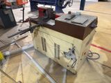 a machine that is sitting on a table in a room