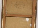 an old picture of a wooden box with a sign on it