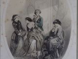 une photo d'un groupe de personnes assises autour d'une table