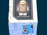 a box with a lego figure inside of it