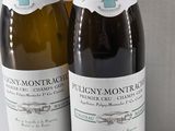 three bottles of wine sitting next to each other on top of a table