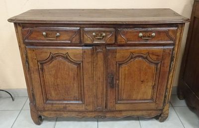 a wooden cabinet with two drawers and a door