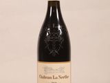 a bottle of wine that is sitting on a table