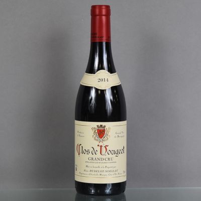 a bottle of wine that is sitting on a table