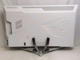 the back of a white asus gaming computer sitting on top of a white table