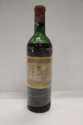 a bottle of wine that is sitting on a table