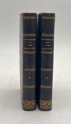 a pair of black books sitting on top of each other