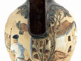 a vase with a painting on it on a white background