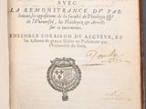 an open book with a picture of a coat of arms and a seal on it