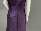 a woman ' s purple dress on a mannequin mannequin mannequin mannequin mannequin mannequin mannequin mannequin