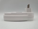 a close up of a white charger with two plugs on it