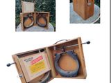a picture of a wooden box with a pair of scissors in it
