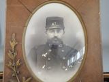 a picture of a man in a military uniform in a picture frame