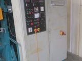 a machine that is sitting inside of a building