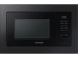 a close up of a black microwave oven on a white background